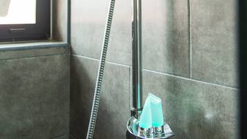 Shower, eco-friendly toiletries, towels, soap