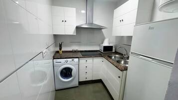 Apartamento Deluxe, junto a la playa | Cocina privada