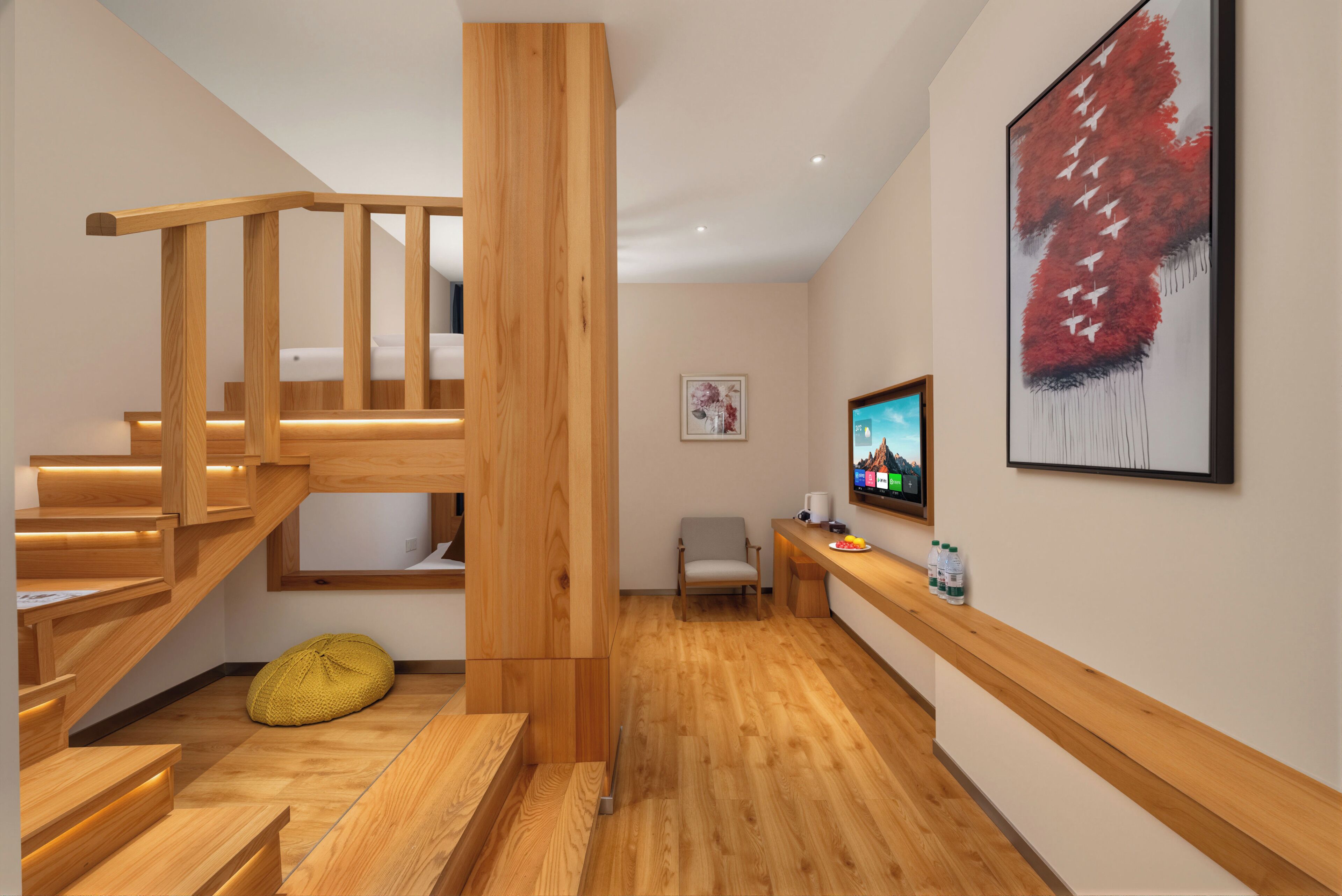 Business Triple Room | Living area | LCD TV, books
