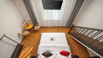 Basic Quadruple Room | Down comforters, desk, laptop workspace, blackout drapes