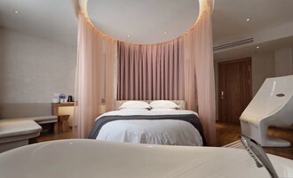 Deluxe Double Room | Down comforters, desk, laptop workspace, blackout drapes
