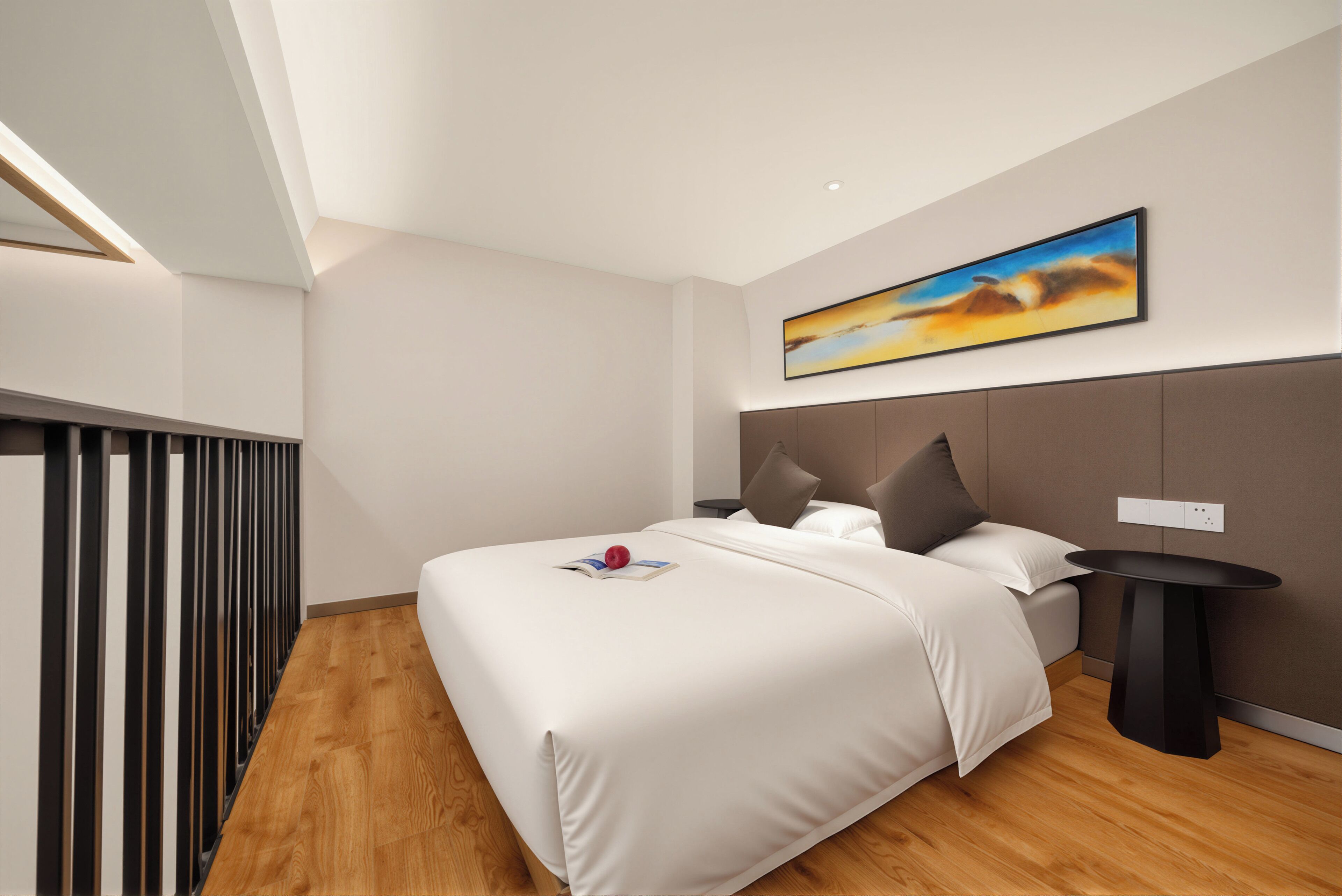 A modern hotel room with a large bed, a bedside table, and a painting on the wall.