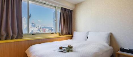 Coffres-forts dans les chambres, fer et planche à repasser