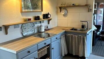 Fridge, toaster, cookware/dishes/utensils