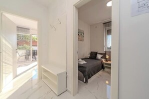 2 habitaciones, tabla de planchar con plancha, wifi y ropa de cama 