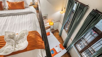 Deluxe Quadruple Room, 2 Queen Beds | Free WiFi