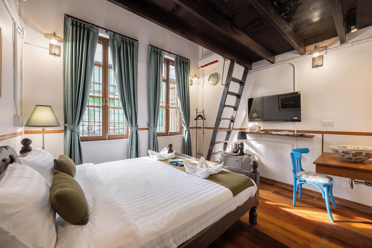 Deluxe vierpersoonskamer, 2 queensize bedden, niet-roken, airconditioning | Gratis wifi