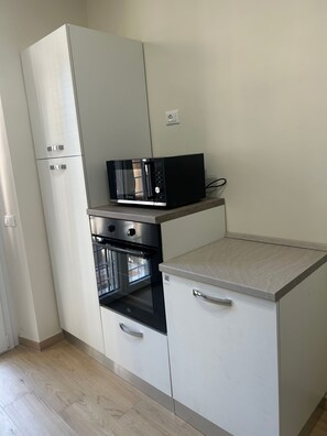 Apartamento (1 Bedroom) | Cozinha privada | Micro-ondas, cooktop, lava-louças, máquina de café expresso