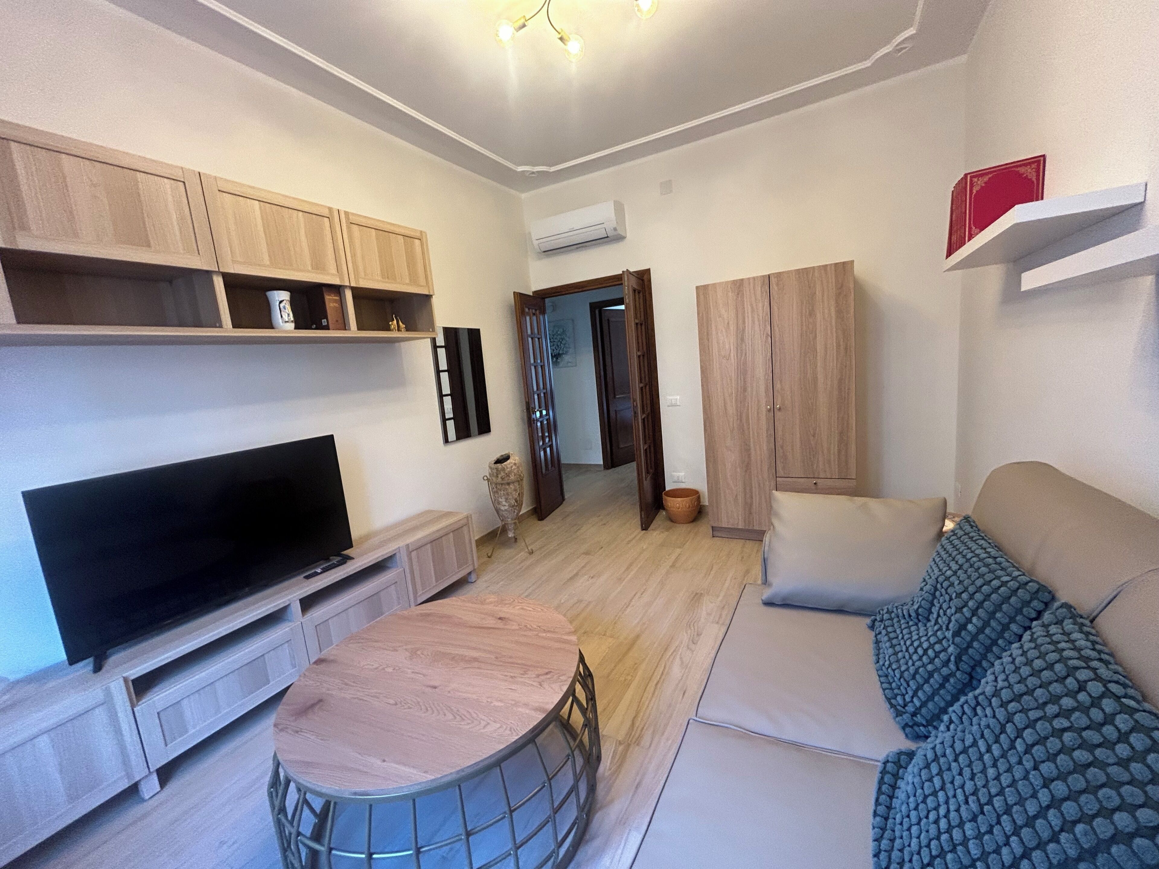Apartment (1 Bedroom) | Living area | 32-inch flat-screen TV with cable channels