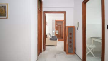 Apartment (2 Bedrooms) | Living area | 32-inch Smart TV with cable channels