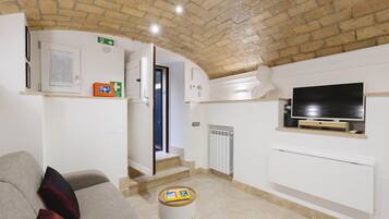 Appartamento (1 Bedroom) | Area soggiorno | TV