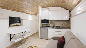 Apartment (1 Bedroom) | Living area | TV