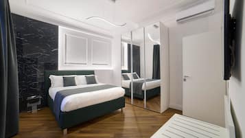 Kamar (1 Bedroom) | 1 kamar tidur, tempat tidur bayi (biaya tambahan), dan seprai linen