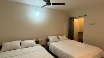 Quarto triplo luxo, vista para a cidade | Wi-Fi de cortesia