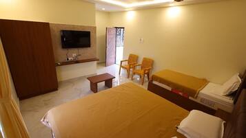 Quarto triplo luxo, vista para a cidade | Wi-Fi de cortesia