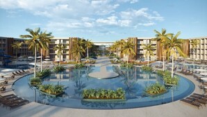 A resort with a central pool, palm trees, and lounge areas. - PORTO 2 LIFE RESORT (Ipojuca)