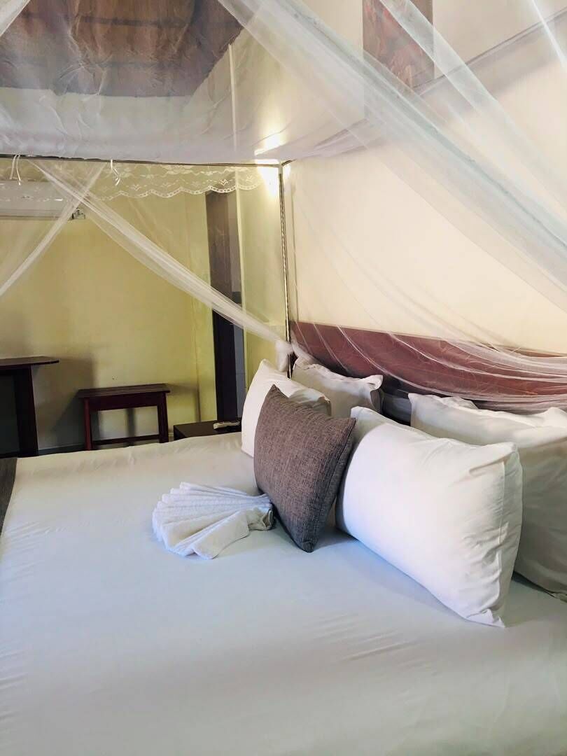 Suite Deluxe, vistes al jardí | Planxa i posts de planxar, wifi gratuïta i roba de llit 