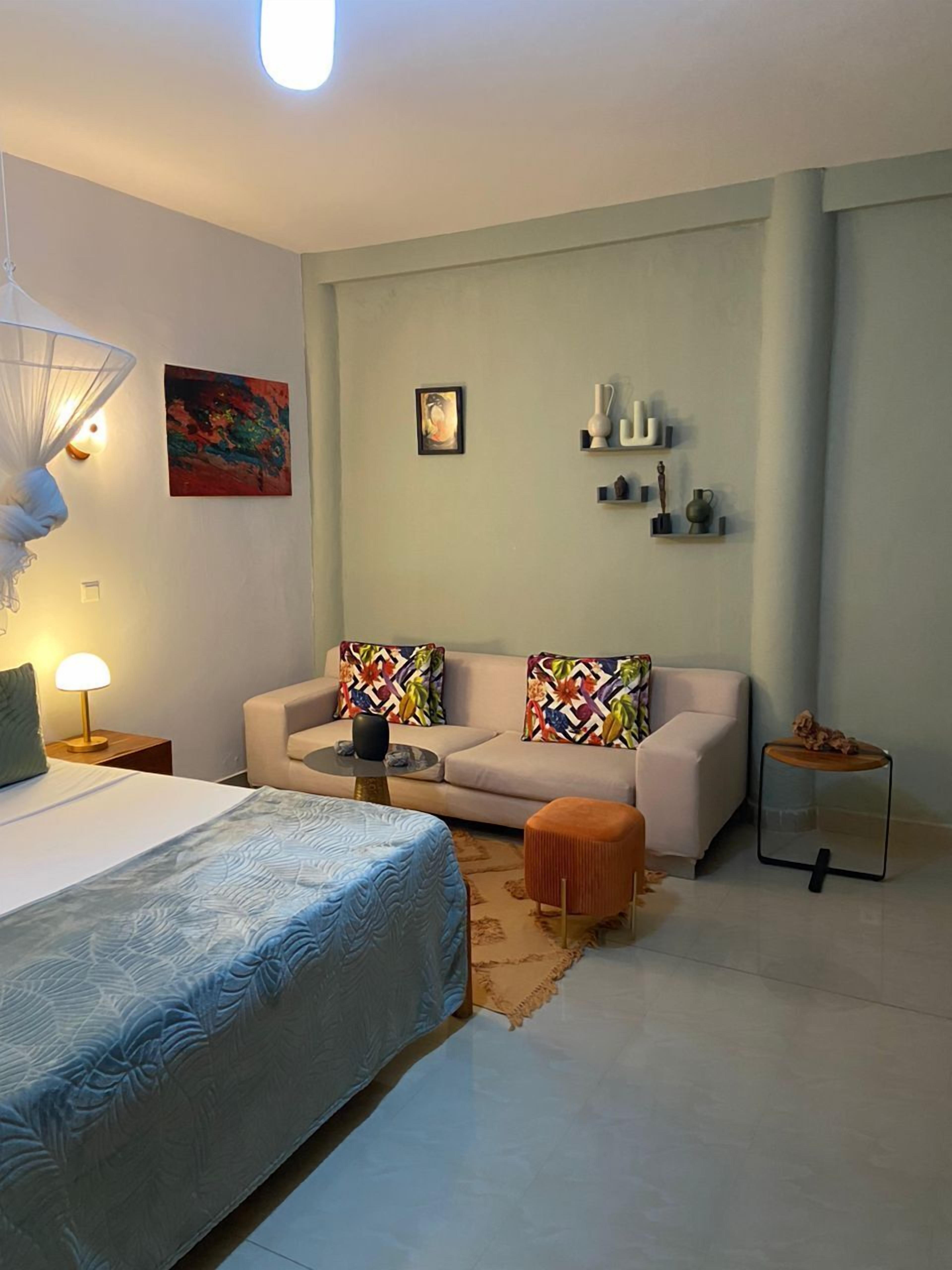 Deluxe Suite, Garden View | Desk, laptop workspace, free WiFi