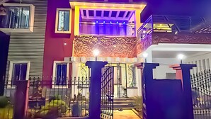 A multi-story house with a balcony and a gated entrance. - Swapno Chhobi (Bolpur)