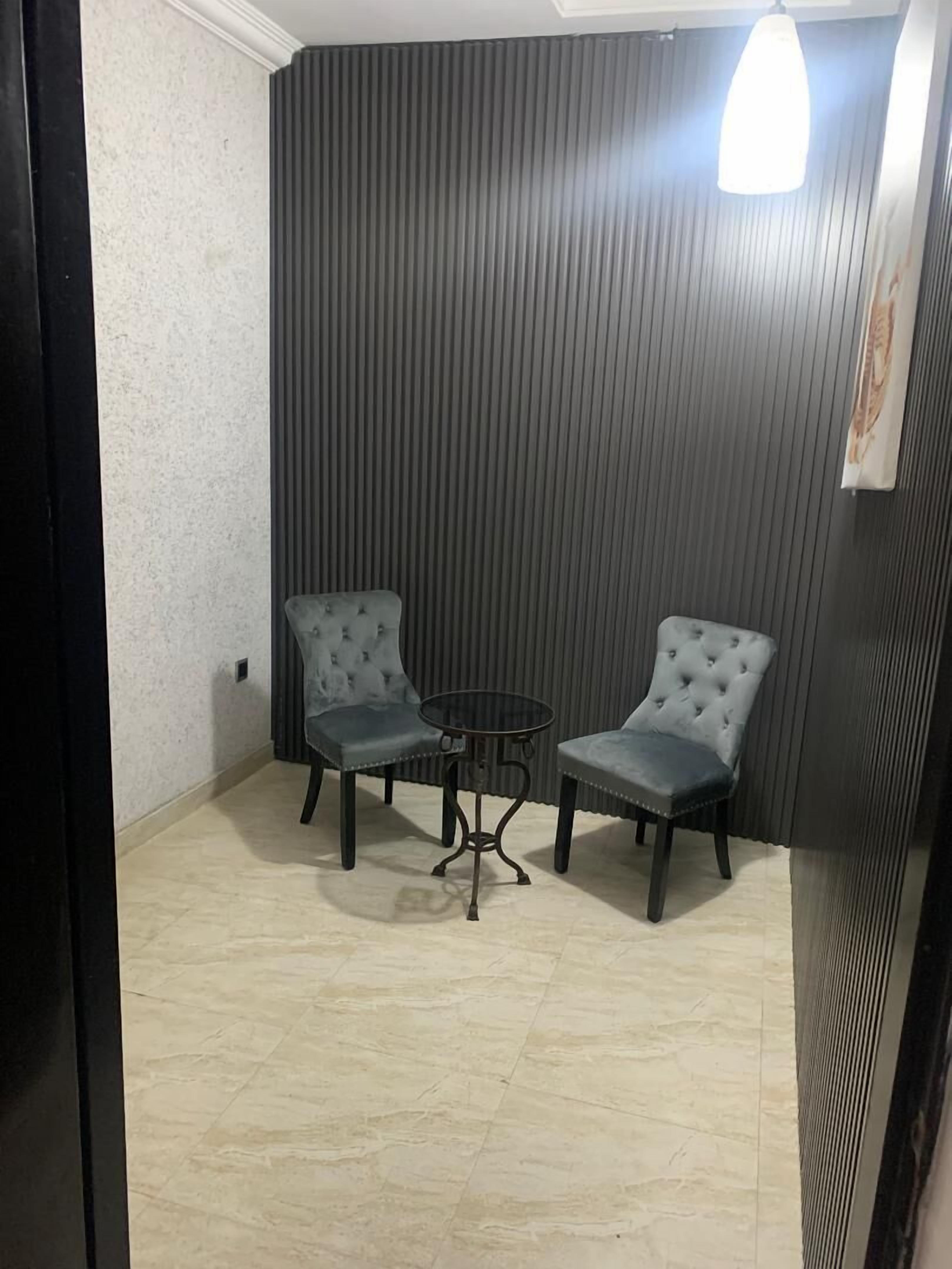 Habitación Deluxe | Área de sala de estar