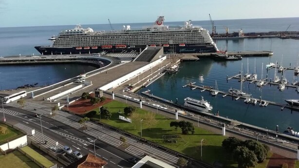 A large cruise ship docked at a port with a marina in the foreground. - Apartment in the city center with spectacular views and easy access. (Ponta Delgada)