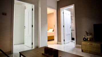 Deluxe Duplex, 3 Bedrooms, Balcony, City View | Living area | Printers