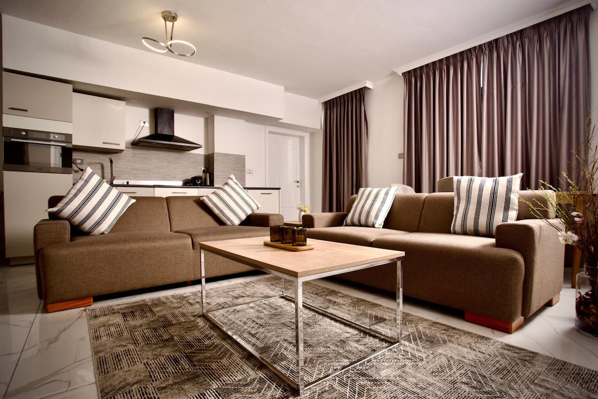 Deluxe-Maisonette, 3 Schlafzimmer, Balkon, Stadtblick | Wohnbereich