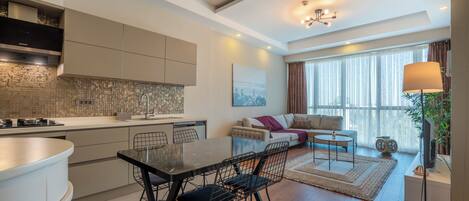 Appart'hôtel Luxe, 1 chambre, animaux de compagnie acceptés, en bord de plage | Coin séjour