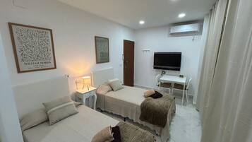 Basic Double Room, Courtyard View | Desk, laptop workspace, free WiFi