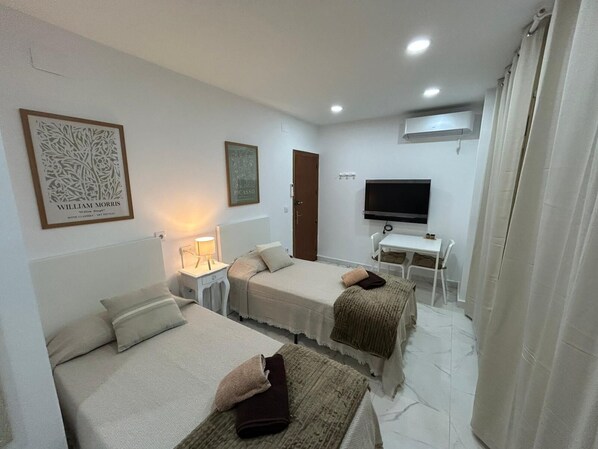 Basic Double Room, Courtyard View | Desk, laptop workspace, free WiFi