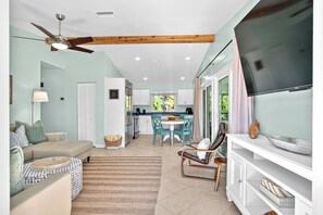 Living area - Sand & Sun A · EV Charger · Pool · 5 Min Beach (Holmes Beach)