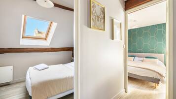 3 slaapkamers, een strijkplank/strijkijzer, wifi