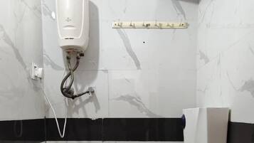 Basic Double Room, City View | Bathroom | Shower, free toiletries, towels, soap