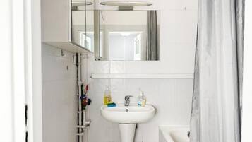 Hair dryer, towels, soap, toilet paper