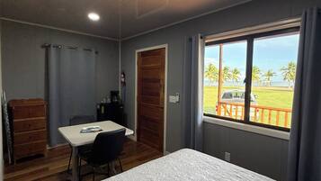 Standard Cabin, Ocean View | In-room safe, desk, blackout drapes, iron/ironing board