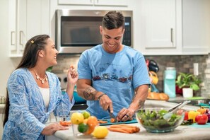 Full-size fridge, microwave, oven, stovetop - Camp Margaritaville Auburndale RV Resort (AUBURNDALE)