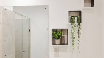 Shower, eco-friendly toiletries, towels, soap