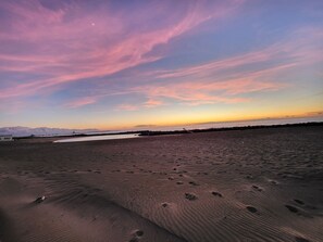 On the beach, sun loungers, beach umbrellas, beach towels