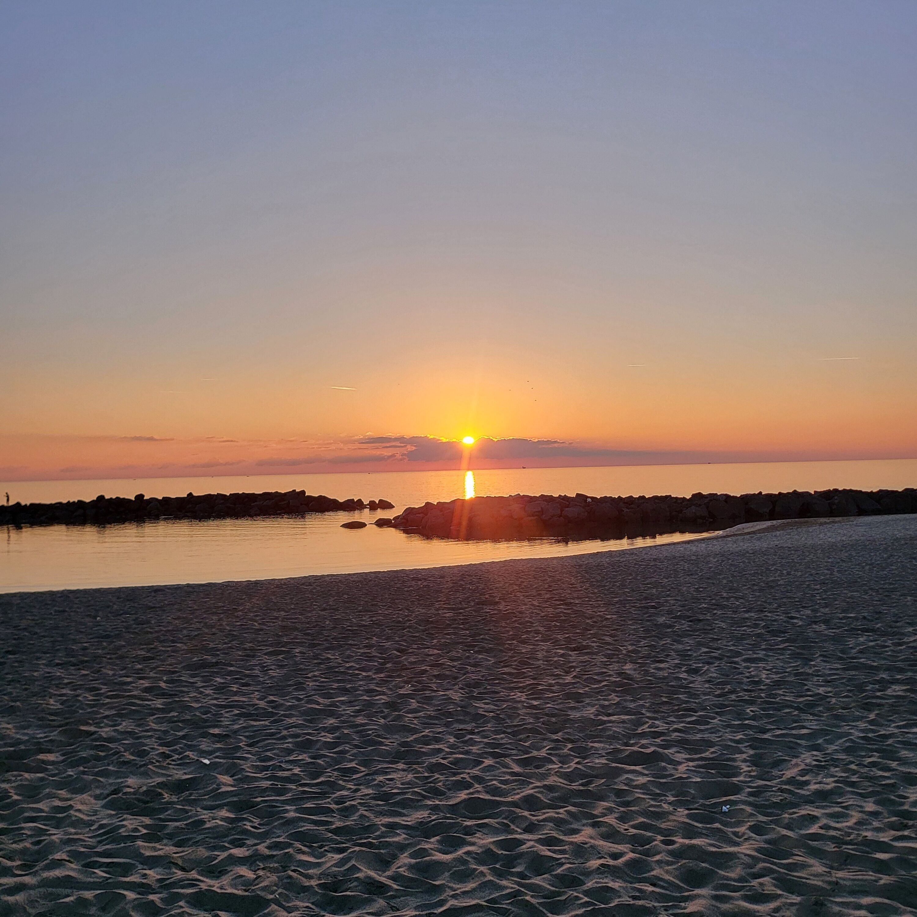 On the beach, sun-loungers, beach umbrellas, beach towels