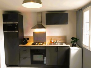 Refrigerador, microondas, horno y parrilla de estufa 