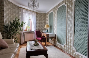 Deluxe Apartment, Non Smoking, Garden View | Living area | TV