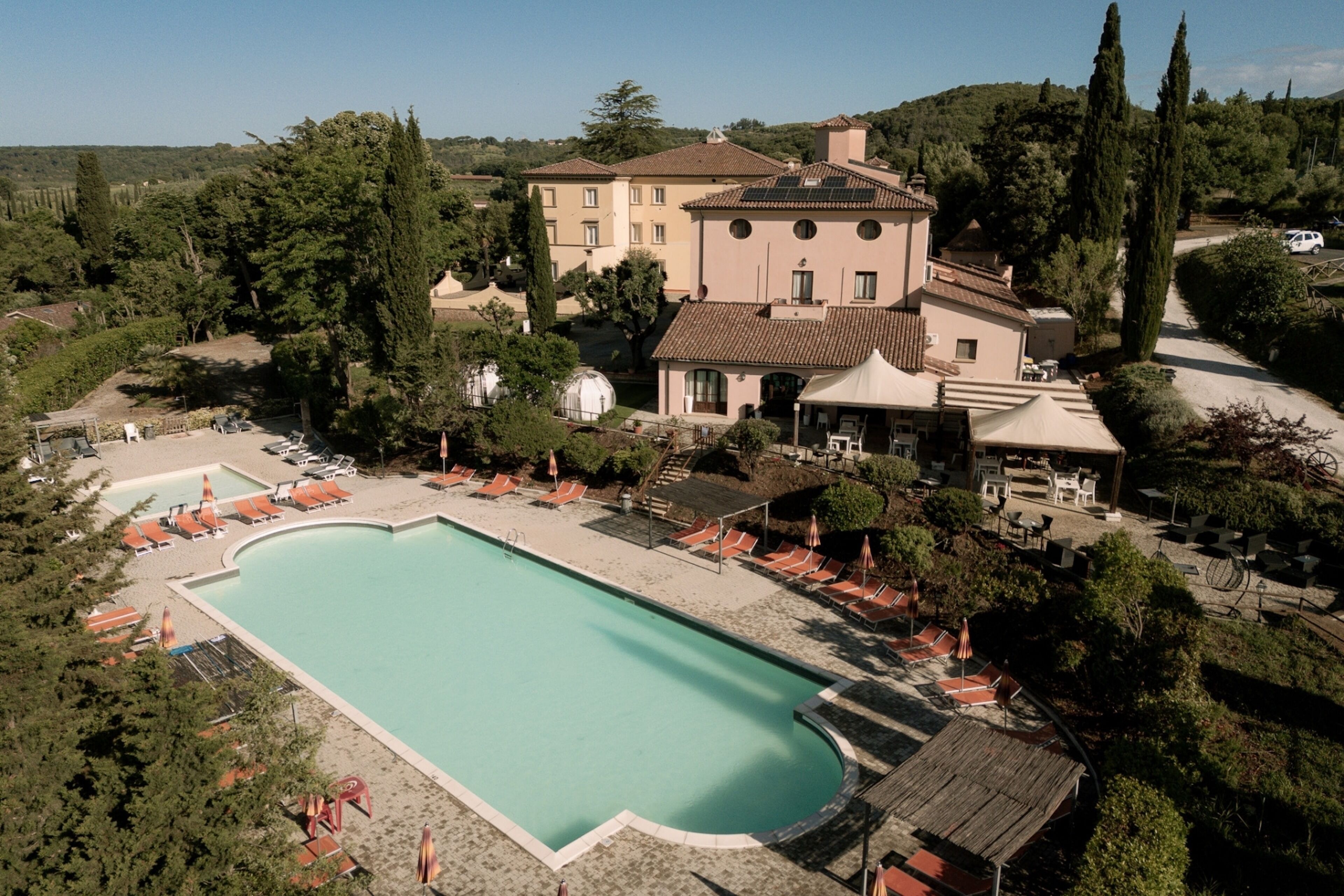 Seasonal outdoor pool, open 10:00 AM to 7:00 PM, pool umbrellas