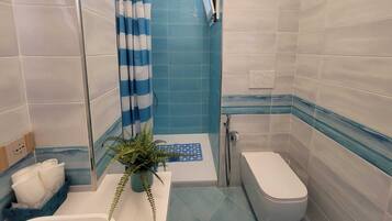 Hair dryer, towels, soap, shampoo