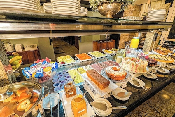Indulge in sweet treats and fresh options at the buffet.