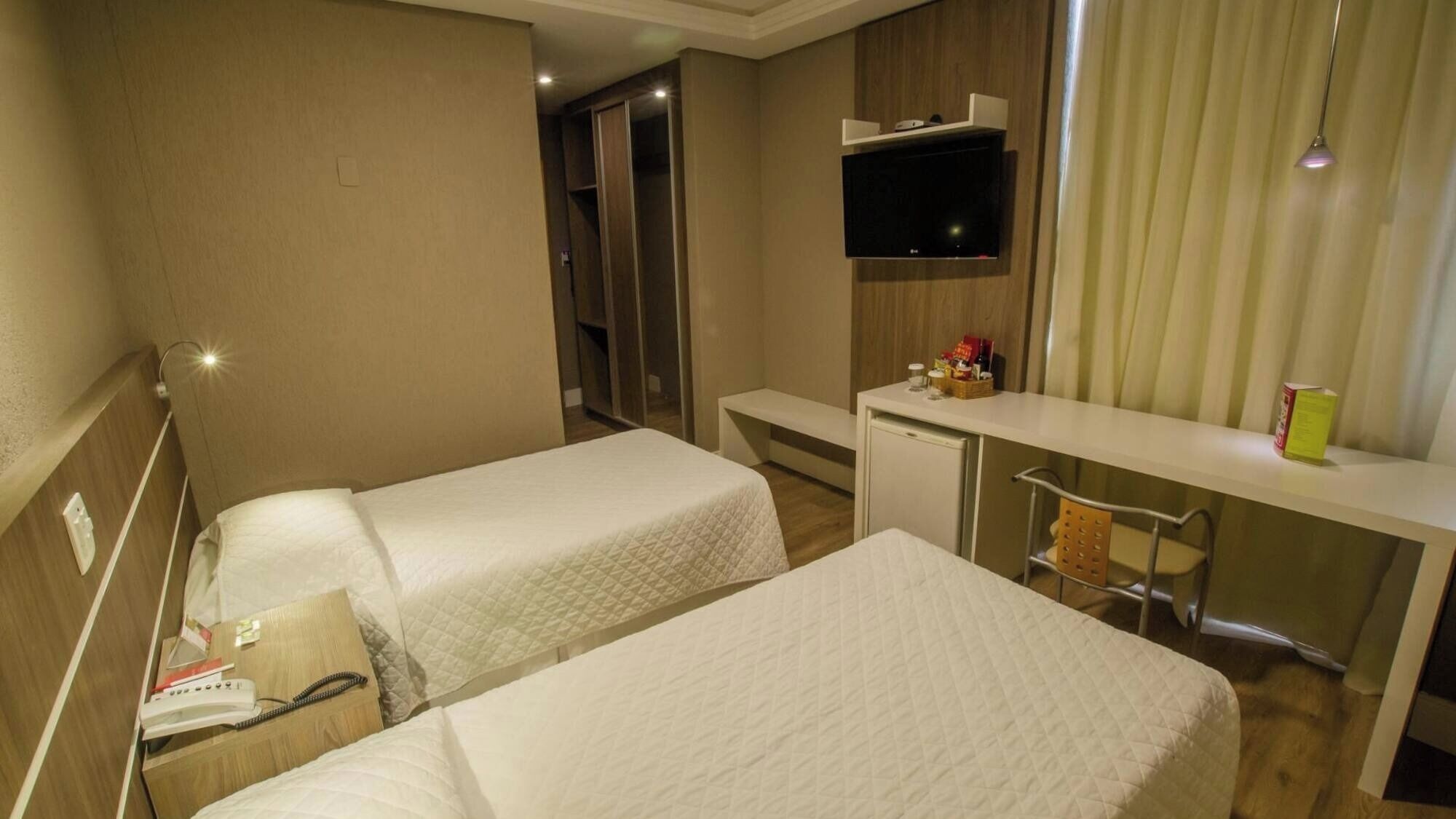 Wi-Fi de cortesia, roupa de cama