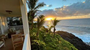 Terrace/patio - Elegant Oceanfront 2BR Home with Vast Panoramic Views, Steps from Kehena Beach (Pāhoa)