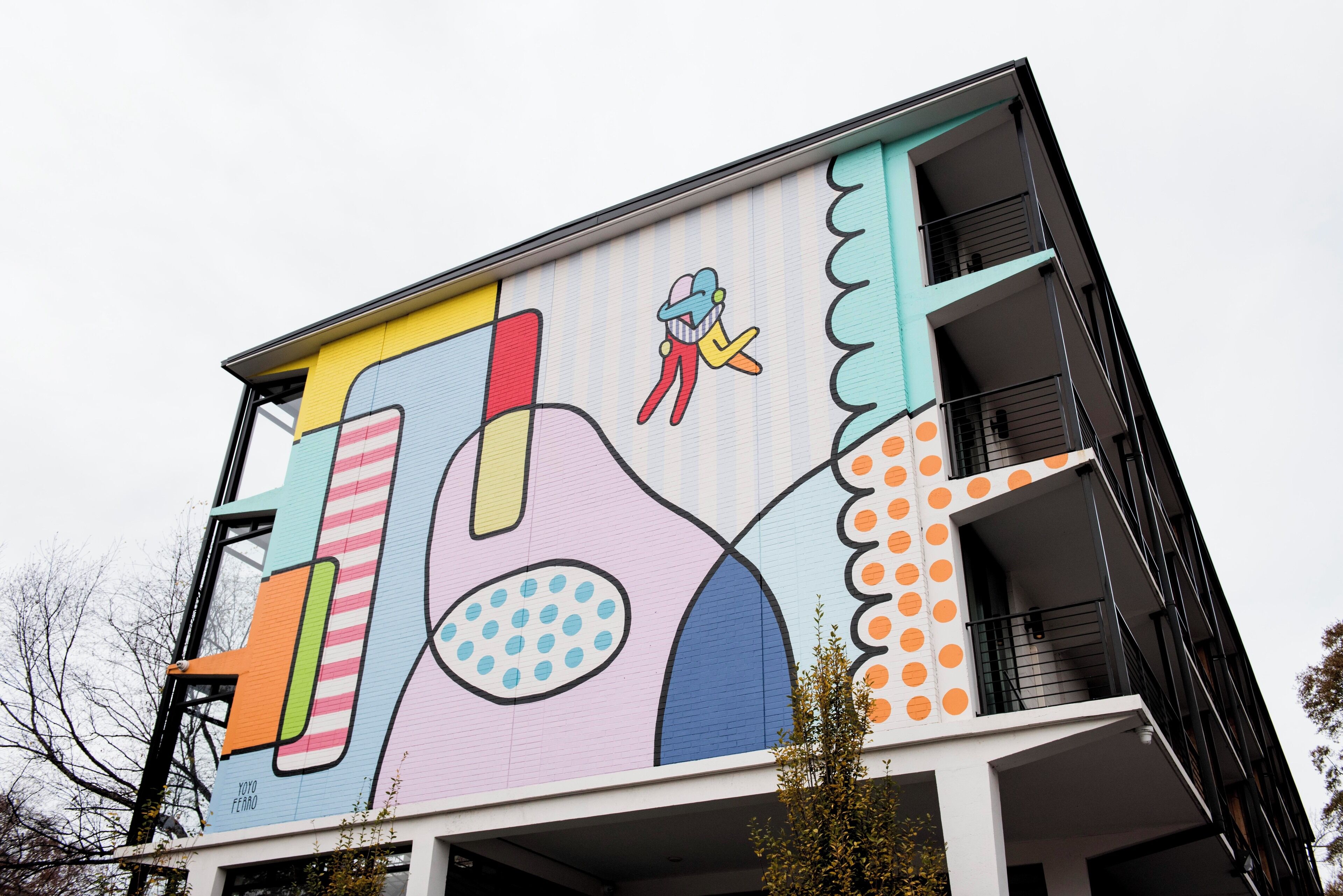A building with a colorful mural on its exterior.