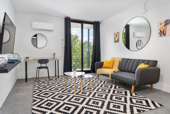 Suite – standard, byutsikt | Oppholdsområde