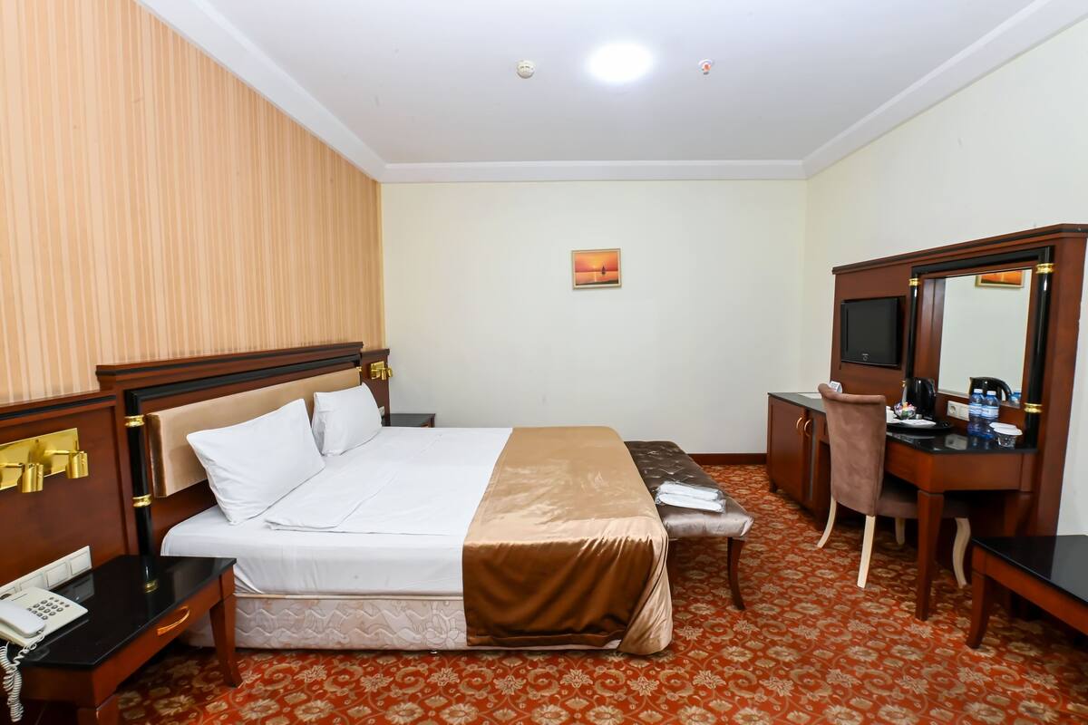 Suite Deluxe, balcón | Escritorio y wifi gratis
