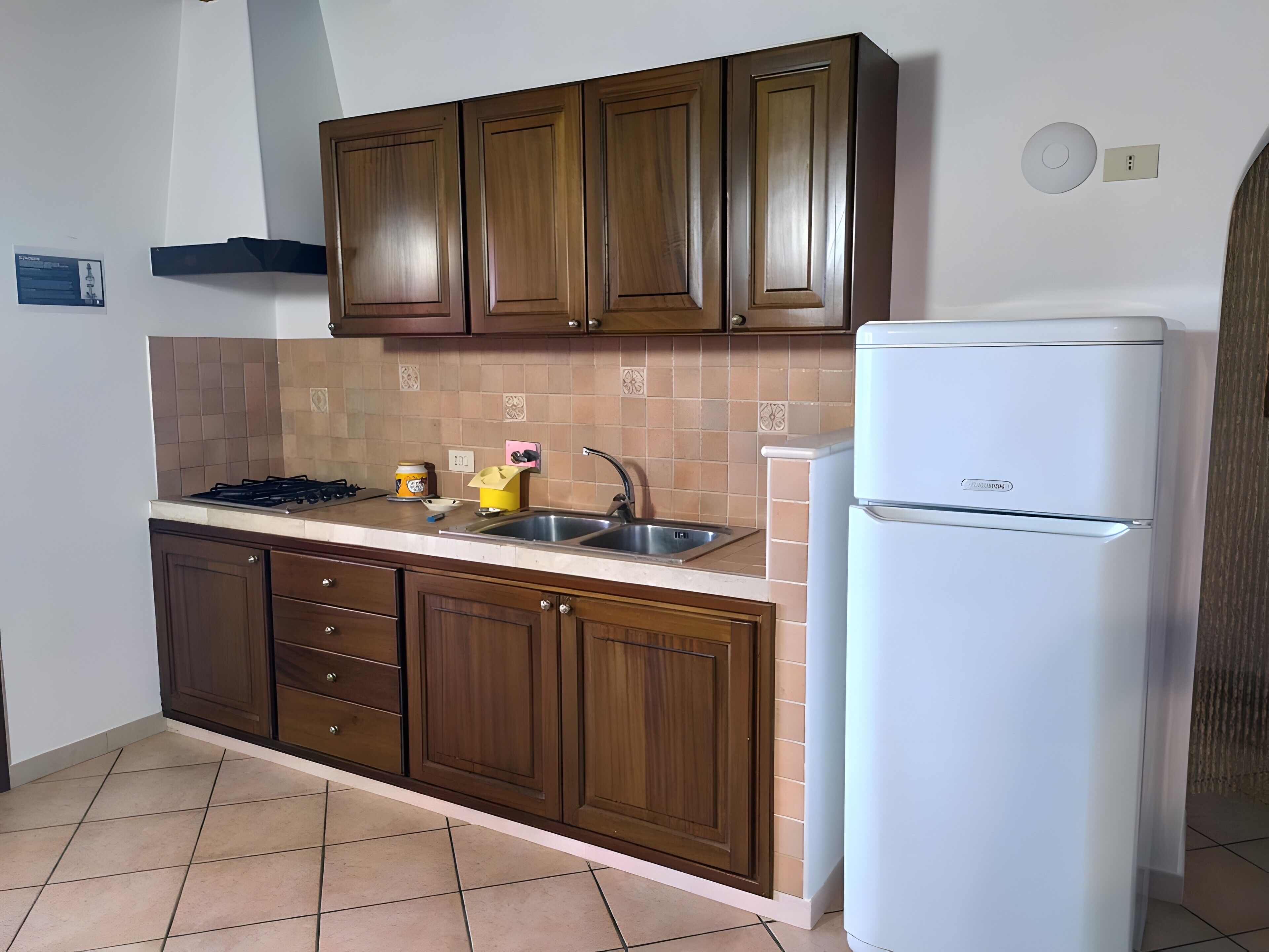 Fridge, stovetop, coffee/tea maker, cookware/dishes/utensils